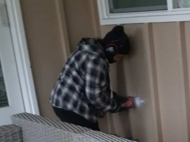 Professional electrician installing an exterior outlet in Portland